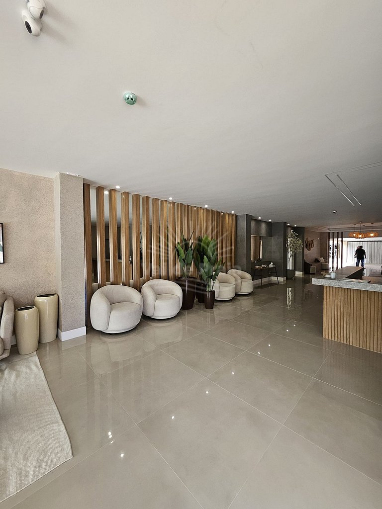 Apartamento acessível em condomínio sofisticado perto da Pra