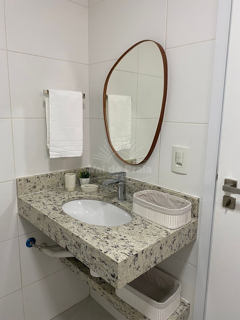 Apartamento acessível em condomínio sofisticado perto da Pra