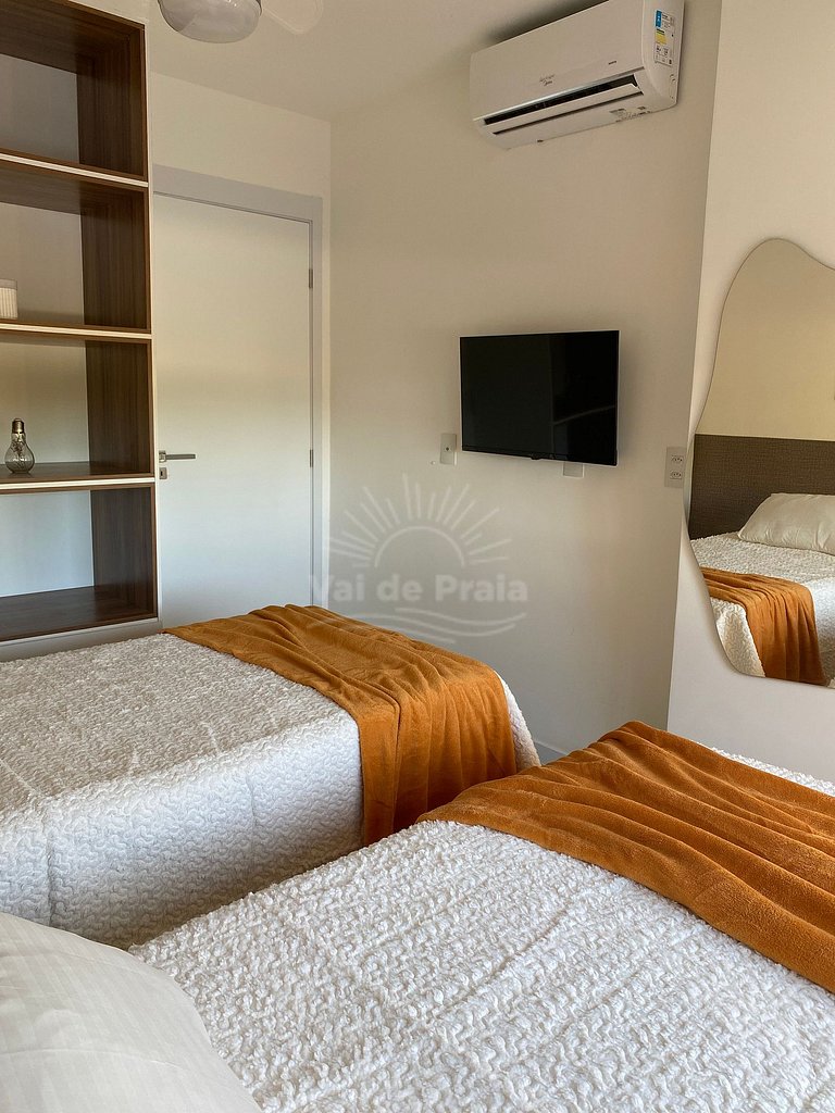 Apartamento acessível em condomínio sofisticado perto da Pra